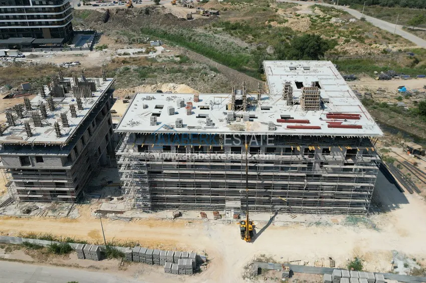 Zdjęcie -  Nieruchomości płynne w budowie w Antalyi - apartamenty na zezwolenia na pobyt i obywatelstwo 1 