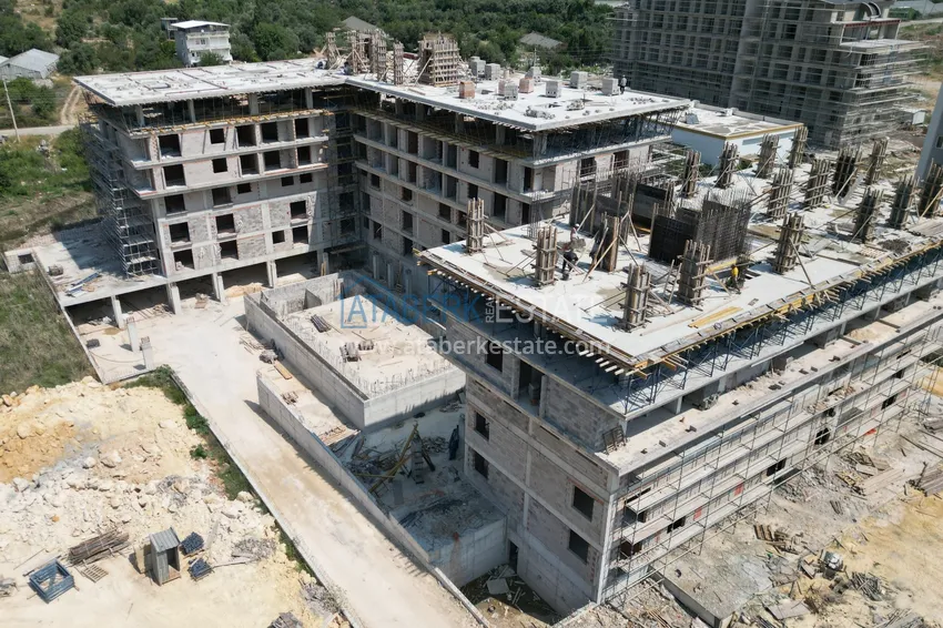 Zdjęcie -  Nieruchomości płynne w budowie w Antalyi - apartamenty na zezwolenia na pobyt i obywatelstwo 9 