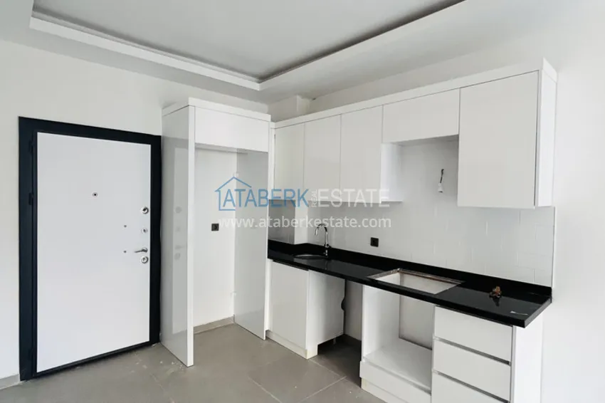Kupuj  Nowy apartament 1+1 w centrum Alanyi — 150 m do plaży Keykubat 1 