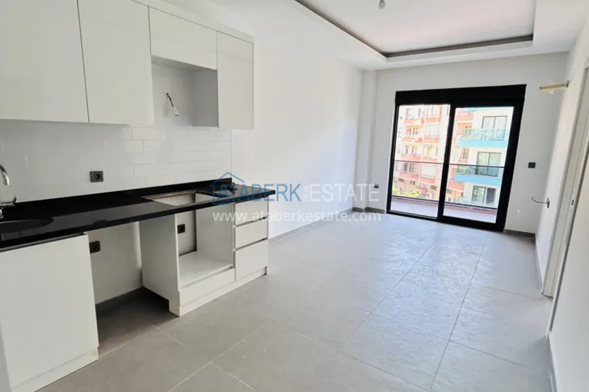 Kupuj  Nowy apartament 1+1 w centrum Alanyi — 150 m do plaży Keykubat 2 