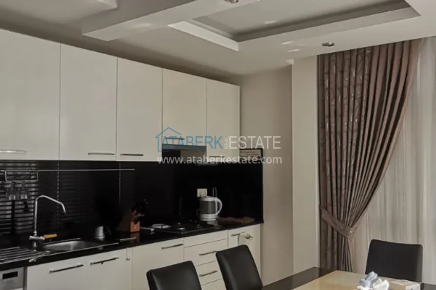 Kupuj  Apartament 2+1 na zezwolenie na pobyt w dzielnicy Alanya Cikcilli - kompleks z infrastrukturą hotelową  1 