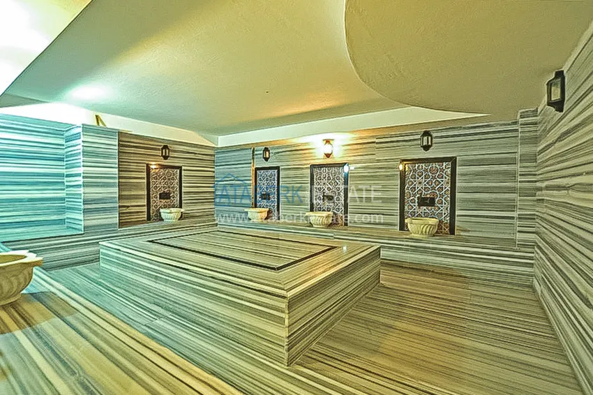 Dwupoziomowy penthouse 2+1 z meblami i widokiem na morze w centrum Mahmutlar 11 