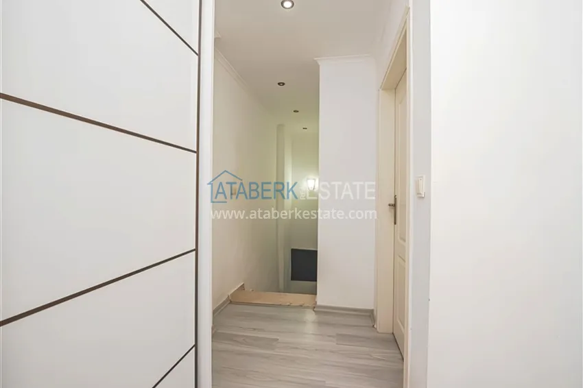 Kupuj  Dwupoziomowy penthouse 2+1 z meblami i widokiem na morze w centrum Mahmutlar 12 