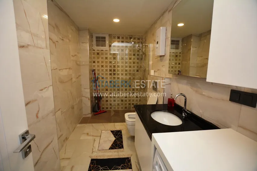 Kupuj  Apartament 2+1 z meblami i częściowym widokiem na morze w Mahmutlar — sprzedaż od właściciela 12 