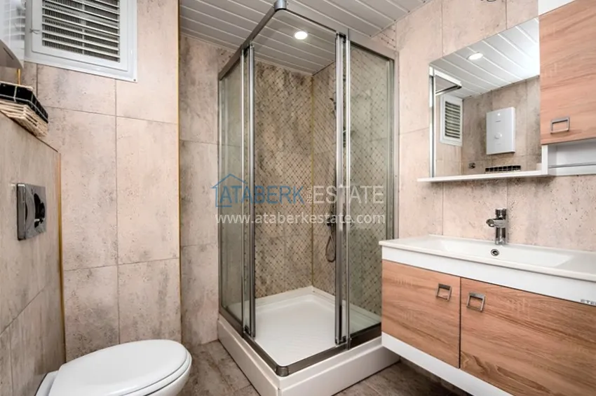 Kupuj  Dwupoziomowy penthouse 2+1 z meblami i widokiem na morze w centrum Mahmutlar 13 