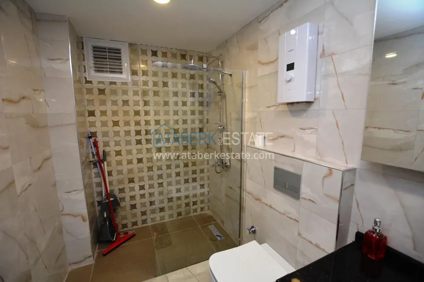 Kupuj  Apartament 2+1 z meblami i częściowym widokiem na morze w Mahmutlar — sprzedaż od właściciela 13 
