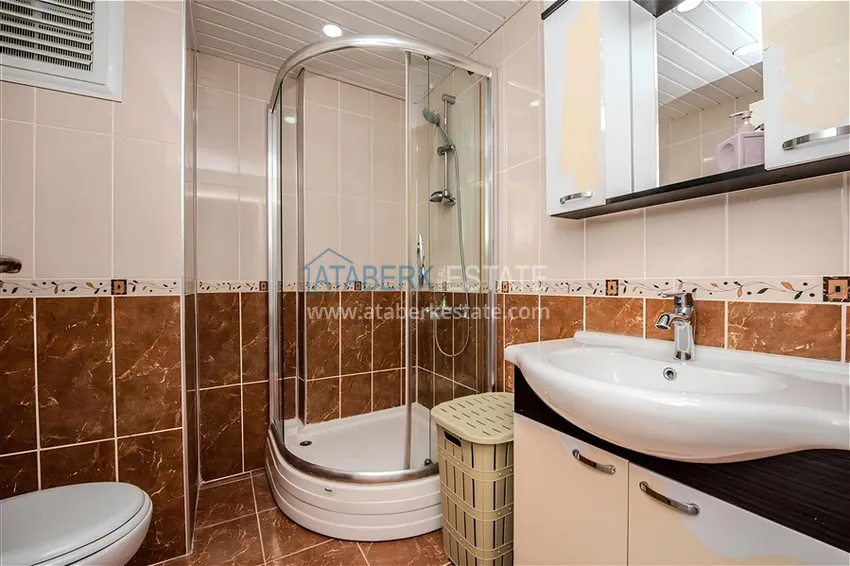 Kupuj  Dwupoziomowy penthouse 2+1 z meblami i widokiem na morze w centrum Mahmutlar 14 