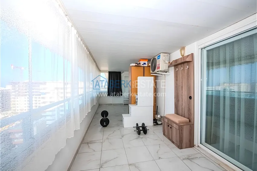 Kupuj  Dwupoziomowy penthouse 2+1 z meblami i widokiem na morze w centrum Mahmutlar 17 
