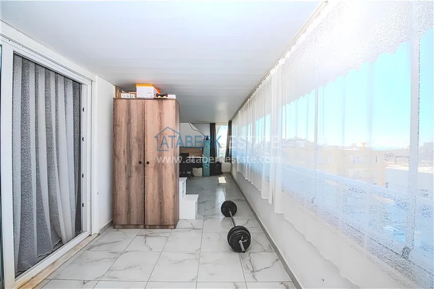 Kupuj  Dwupoziomowy penthouse 2+1 z meblami i widokiem na morze w centrum Mahmutlar 18 