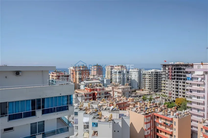 Kupuj  Dwupoziomowy penthouse 2+1 z meblami i widokiem na morze w centrum Mahmutlar 19 