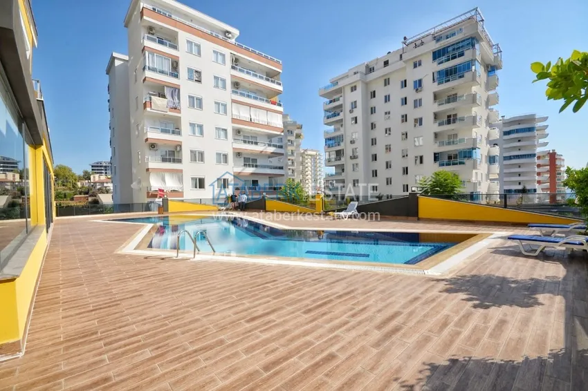 Apartament 2+1 z meblami i częściowym widokiem na morze w Mahmutlar — sprzedaż od właściciela 1 