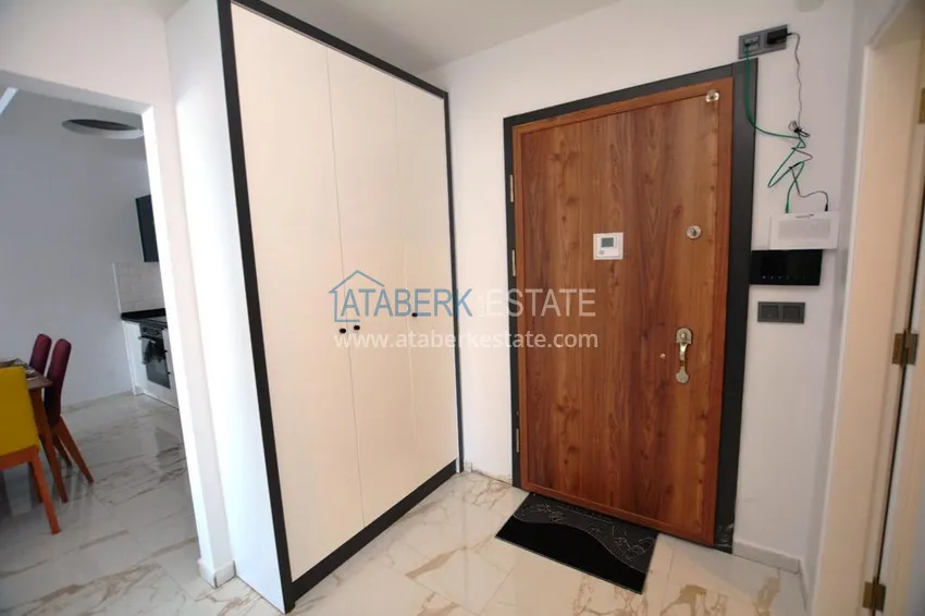 Kupuj  Apartament 2+1 z meblami i częściowym widokiem na morze w Mahmutlar — sprzedaż od właściciela 1 