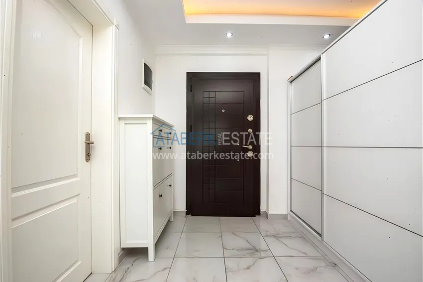 Kupuj  Dwupoziomowy penthouse 2+1 z meblami i widokiem na morze w centrum Mahmutlar 1 