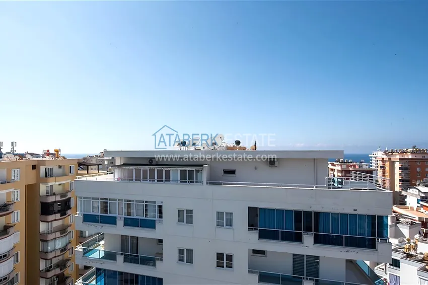 Kupuj  Dwupoziomowy penthouse 2+1 z meblami i widokiem na morze w centrum Mahmutlar 21 