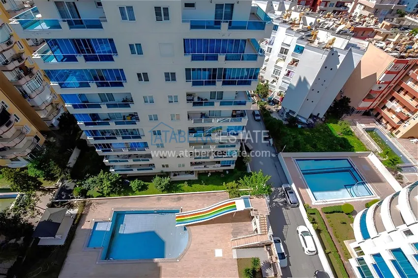 Kupuj  Dwupoziomowy penthouse 2+1 z meblami i widokiem na morze w centrum Mahmutlar 22 