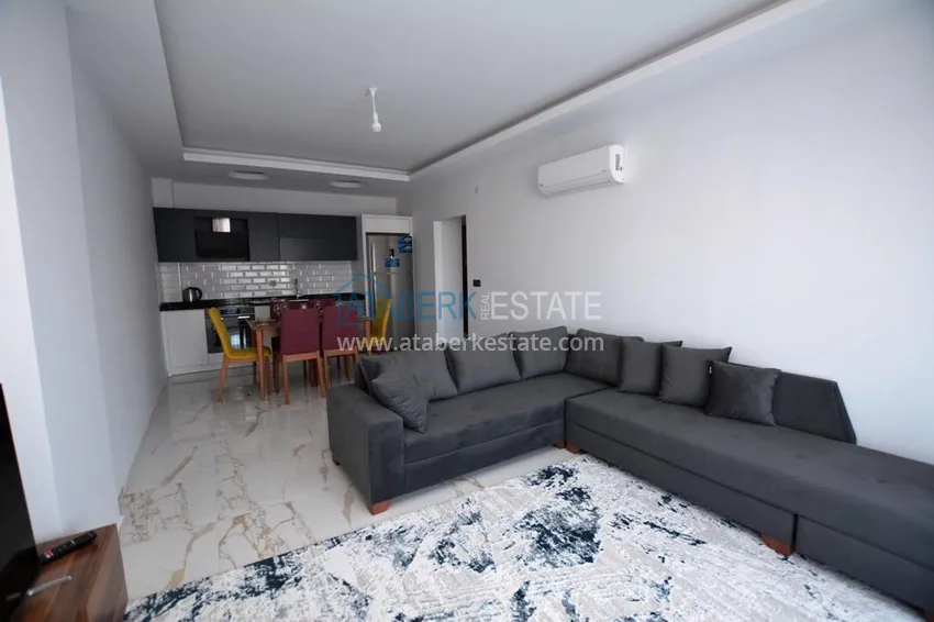 Kupuj  Apartament 2+1 z meblami i częściowym widokiem na morze w Mahmutlar — sprzedaż od właściciela 3 