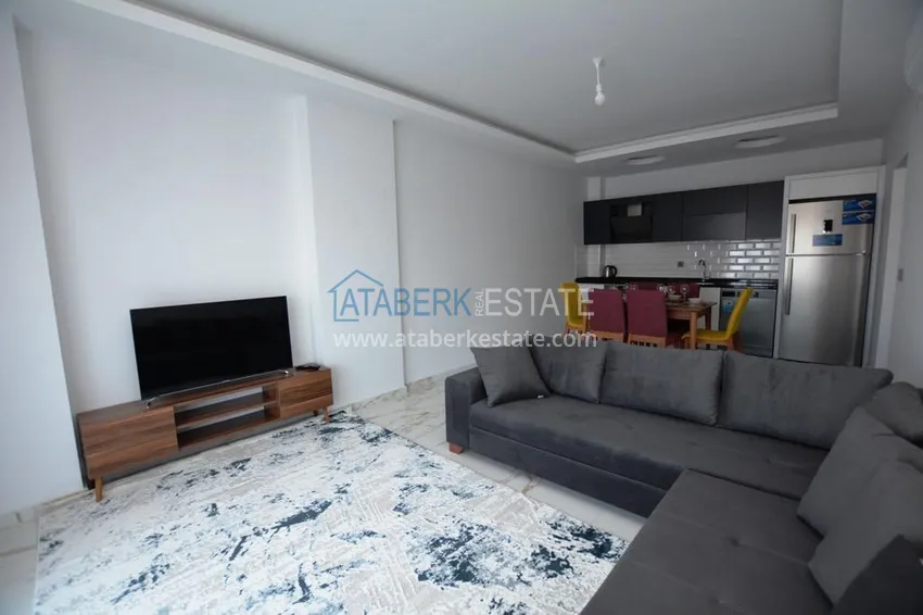Kupuj  Apartament 2+1 z meblami i częściowym widokiem na morze w Mahmutlar — sprzedaż od właściciela 4 