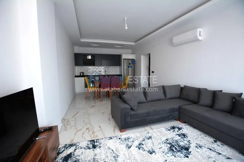 Kupuj  Apartament 2+1 z meblami i częściowym widokiem na morze w Mahmutlar — sprzedaż od właściciela 5 