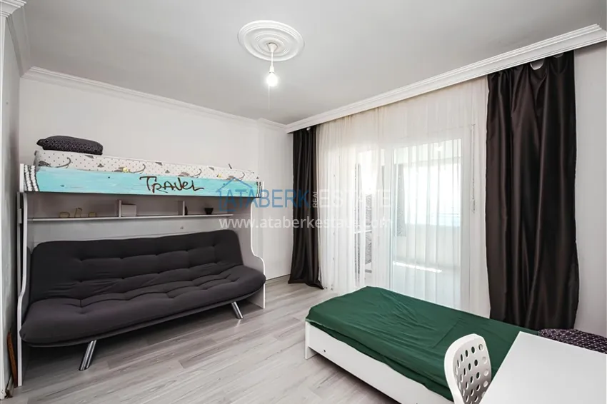 Kupuj  Dwupoziomowy penthouse 2+1 z meblami i widokiem na morze w centrum Mahmutlar 8 