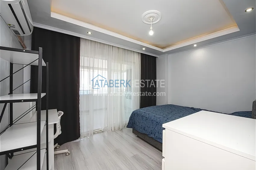 Kupuj  Dwupoziomowy penthouse 2+1 z meblami i widokiem na morze w centrum Mahmutlar 9 