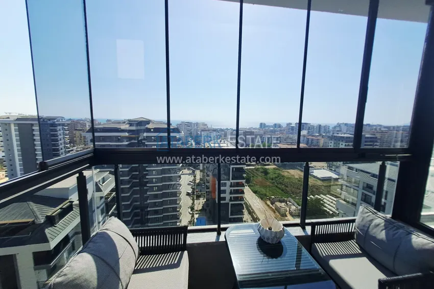 Kupuj  Apartament 2+1 z meblami, przeszklonym balkonem i widokiem na morze w centrum Mahmutlar, Alanya 14 