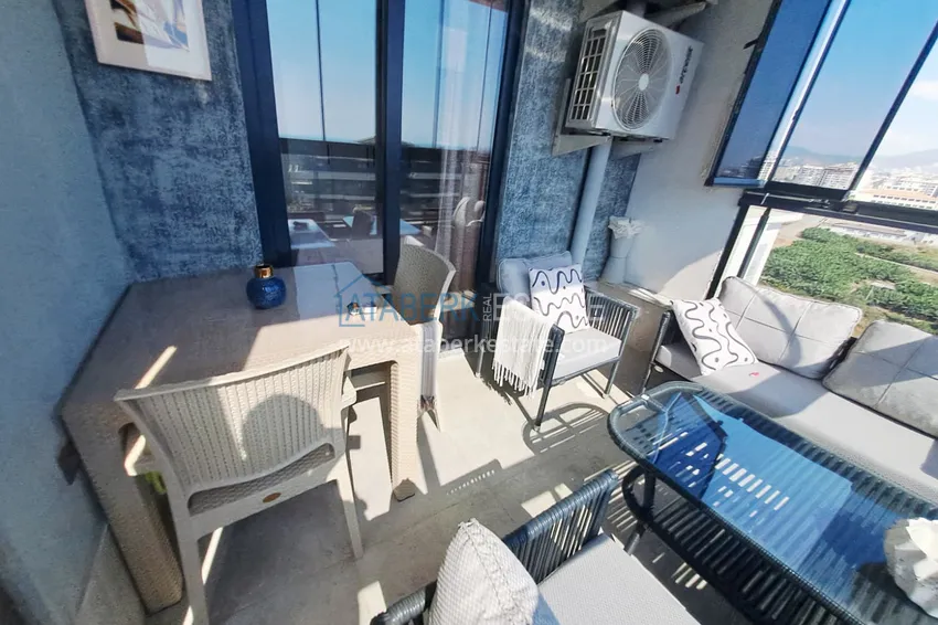 Kupuj  Apartament 2+1 z meblami, przeszklonym balkonem i widokiem na morze w centrum Mahmutlar, Alanya 15 