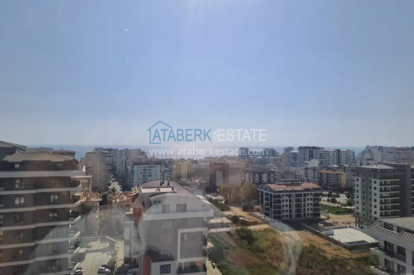 Kupuj  Apartament 2+1 z meblami, przeszklonym balkonem i widokiem na morze w centrum Mahmutlar, Alanya 17 