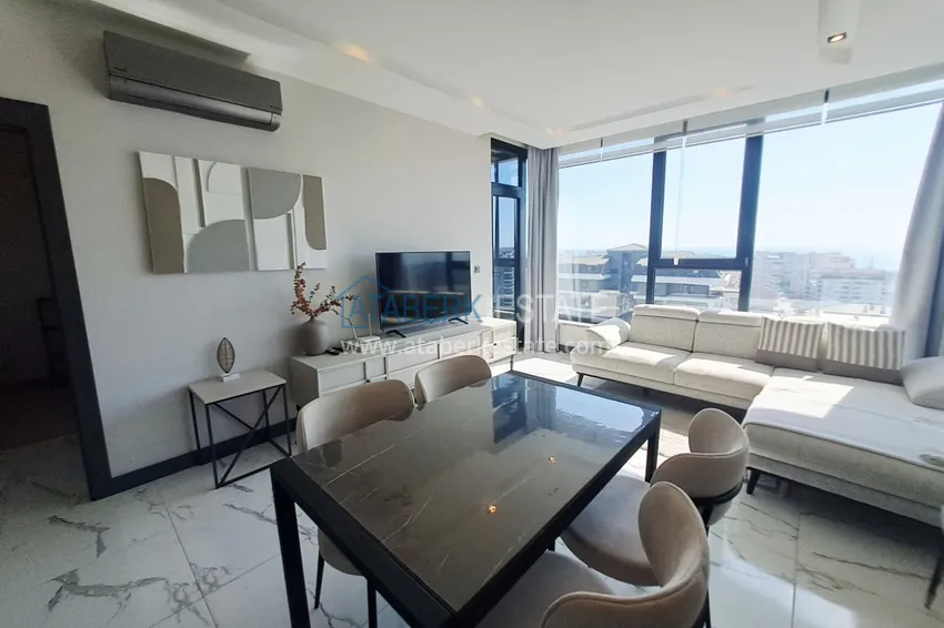 Kupuj  Apartament 2+1 z meblami, przeszklonym balkonem i widokiem na morze w centrum Mahmutlar, Alanya 6 