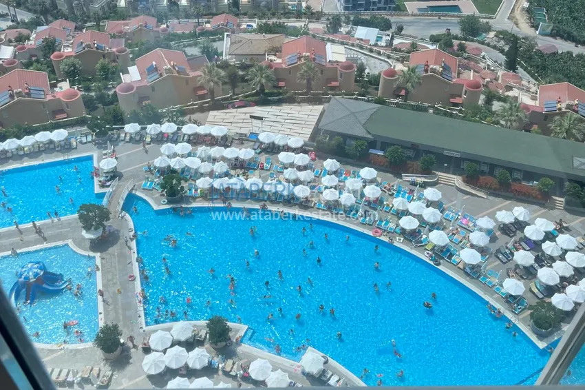 Kupuj  Umeblowane mieszkanie 2+1 do wynajęcia w Alanyi, dzielnica Mahmutlar — legendarny kompleks hotelowy z prywatną plażą nr 708 11 