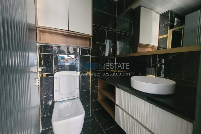 Kupuj  Apartament 1+1 W Alanya, dzielnica Oba - piękne wykończenie, nowoczesny kompleks  8 