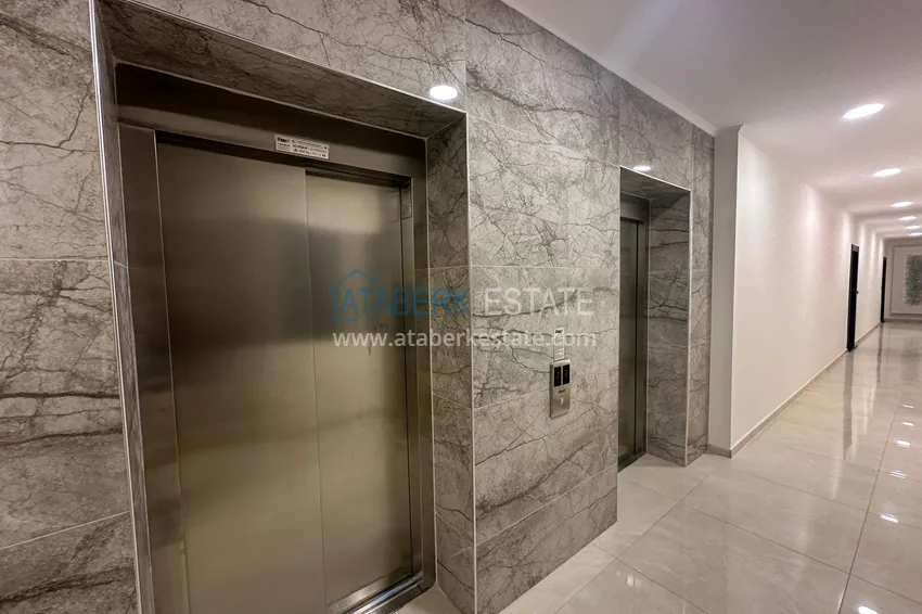 Apartament 2+1 w centrum Alanyi - z oddzielną kuchnią i widokiem na góry, odpowiedni na zezwolenie na pobyt 3 