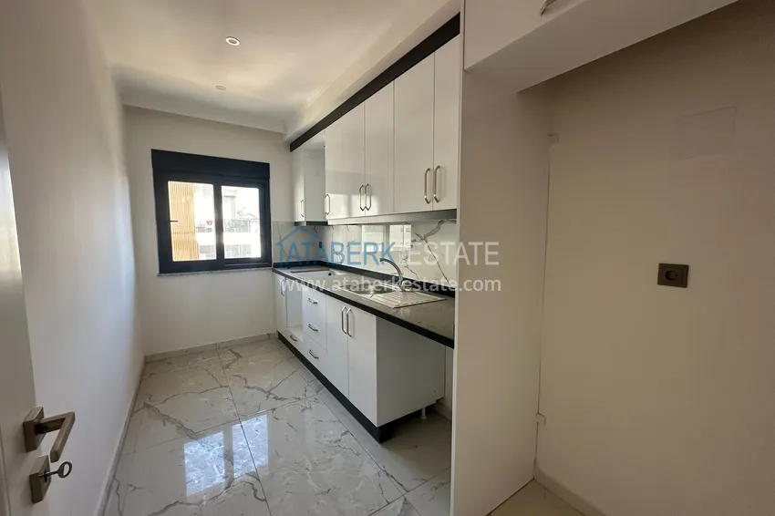 Kupuj  Apartament 2+1 w centrum Alanyi - z oddzielną kuchnią i widokiem na góry, odpowiedni na zezwolenie na pobyt 4 