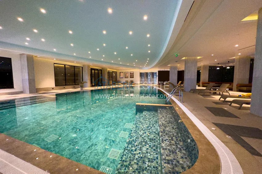 Apartament 1+1 85 m² w kompleksie hotelowym klasy premium na wybrzeżu Turkler — Alanya 59 