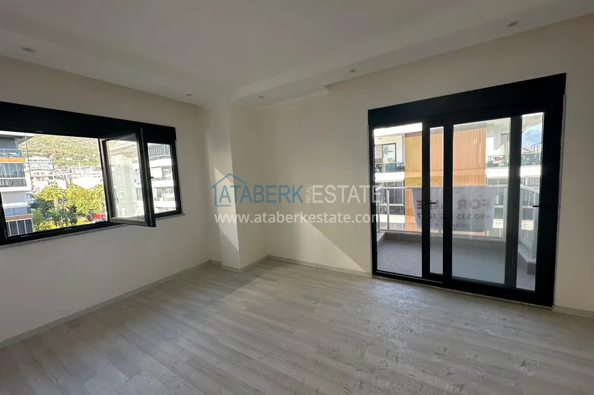 Kupuj  Apartament 2+1 w centrum Alanyi - z oddzielną kuchnią i widokiem na góry, odpowiedni na zezwolenie na pobyt 5 