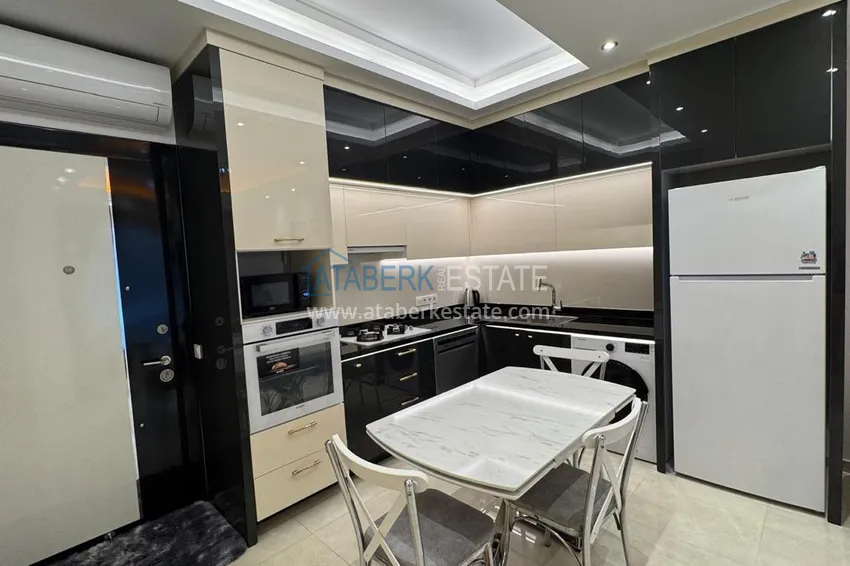 Kupuj  1+1 umeblowane mieszkanie w kompleksie premium, dzielnica Mahmutlar — Alanya  3 