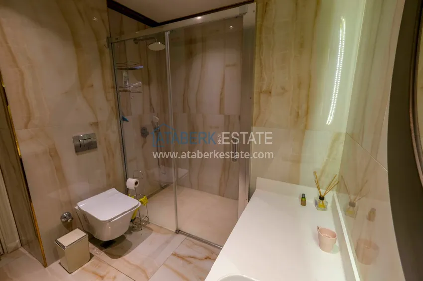 Kupuj  Apartament 1+1 z prywatnym ogrodem w elitarnym kompleksie przy plaży — Alanya, dzielnica Kestel 21 