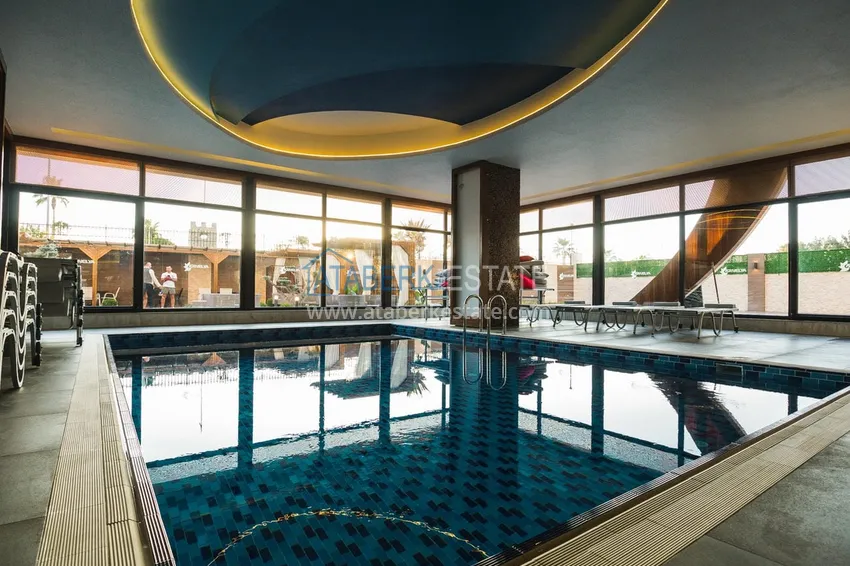Apartament 1+1 z prywatnym ogrodem w elitarnym kompleksie przy plaży — Alanya, dzielnica Kestel 23 