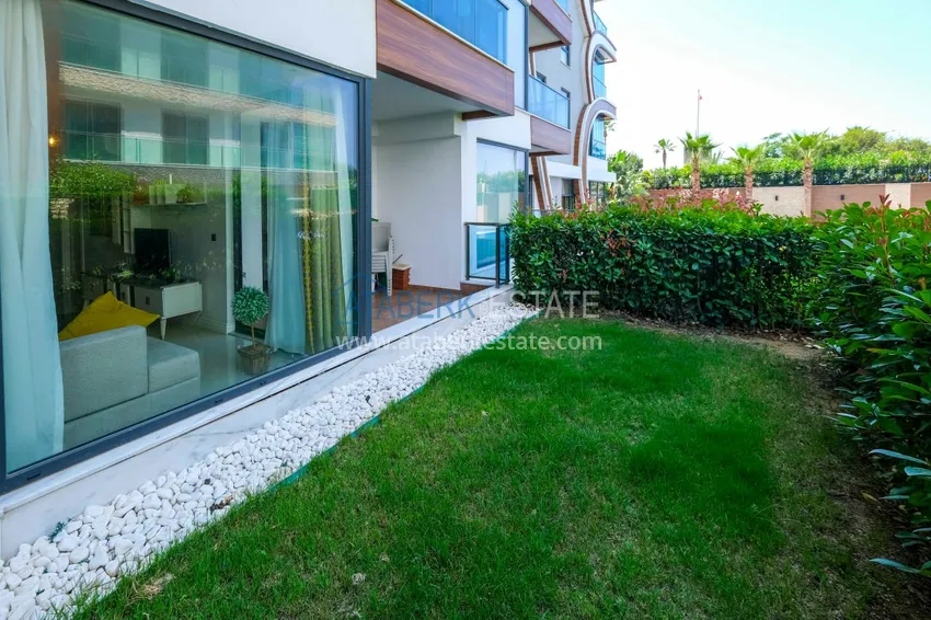 Kupuj  Apartament 1+1 z prywatnym ogrodem w elitarnym kompleksie przy plaży — Alanya, dzielnica Kestel 4 