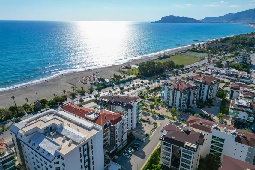 Apartament 1+1 z prywatnym ogrodem w elitarnym kompleksie przy plaży — Alanya, dzielnica Kestel 4 