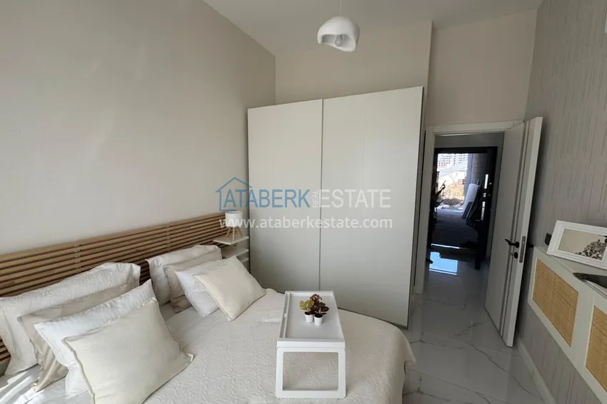 Kupuj  Apartament 1+1 od inwestora w kompleksie w budowie, dzielnica Altintash, Antalya, 55 mkw, 2. piętro 10 