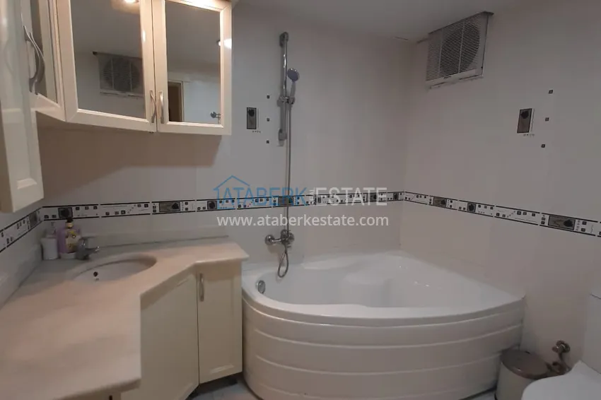 Kupuj  Apartament 2+1 w Alanya, dzielnica Mahmutlar — z meblami, przeszklonymi balkonami w pobliżu Yekta Mall 11 
