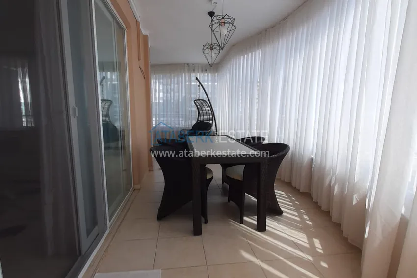 Kupuj  Apartament 2+1 w Alanya, dzielnica Mahmutlar — z meblami, przeszklonymi balkonami w pobliżu Yekta Mall 12 