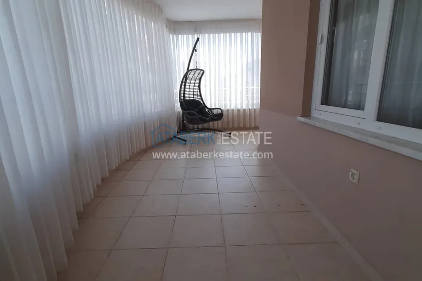 Kupuj  Apartament 2+1 w Alanya, dzielnica Mahmutlar — z meblami, przeszklonymi balkonami w pobliżu Yekta Mall 13 