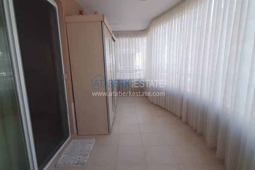 Kupuj  Apartament 2+1 w Alanya, dzielnica Mahmutlar — z meblami, przeszklonymi balkonami w pobliżu Yekta Mall 14 
