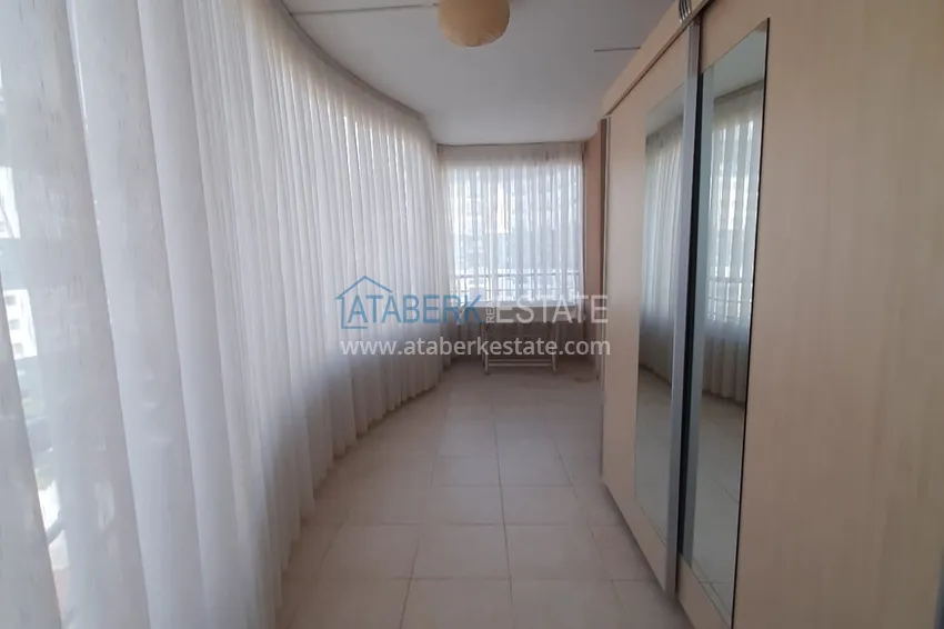 Kupuj  Apartament 2+1 w Alanya, dzielnica Mahmutlar — z meblami, przeszklonymi balkonami w pobliżu Yekta Mall 15 