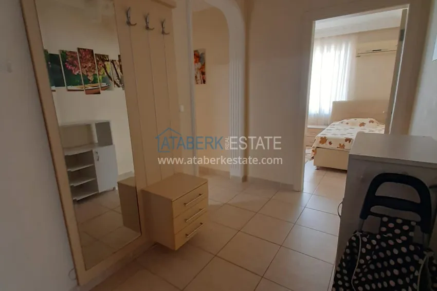 Kupuj  Apartament 2+1 w Alanya, dzielnica Mahmutlar — z meblami, przeszklonymi balkonami w pobliżu Yekta Mall 1 