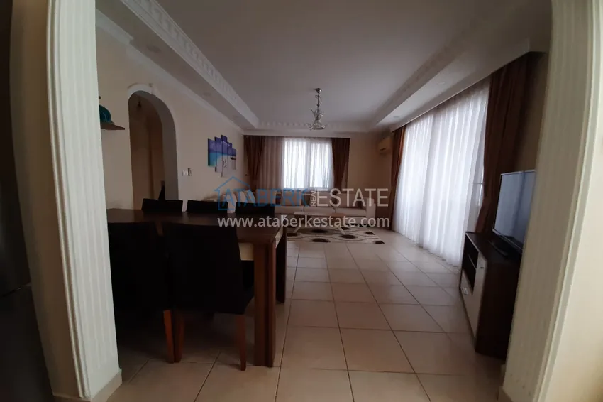 Kupuj  Apartament 2+1 w Alanya, dzielnica Mahmutlar — z meblami, przeszklonymi balkonami w pobliżu Yekta Mall 2 