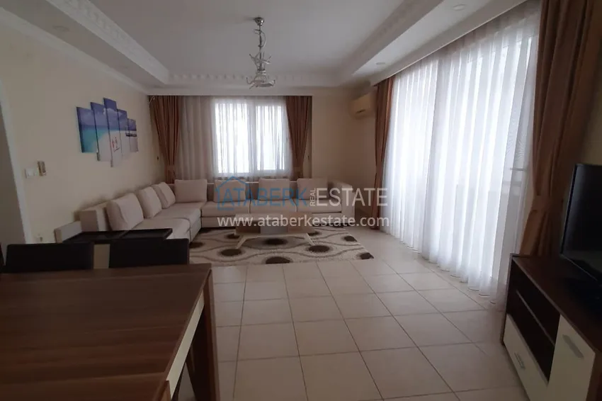 Kupuj  Apartament 2+1 w Alanya, dzielnica Mahmutlar — z meblami, przeszklonymi balkonami w pobliżu Yekta Mall 3 