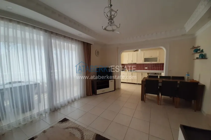 Kupuj  Apartament 2+1 w Alanya, dzielnica Mahmutlar — z meblami, przeszklonymi balkonami w pobliżu Yekta Mall 4 