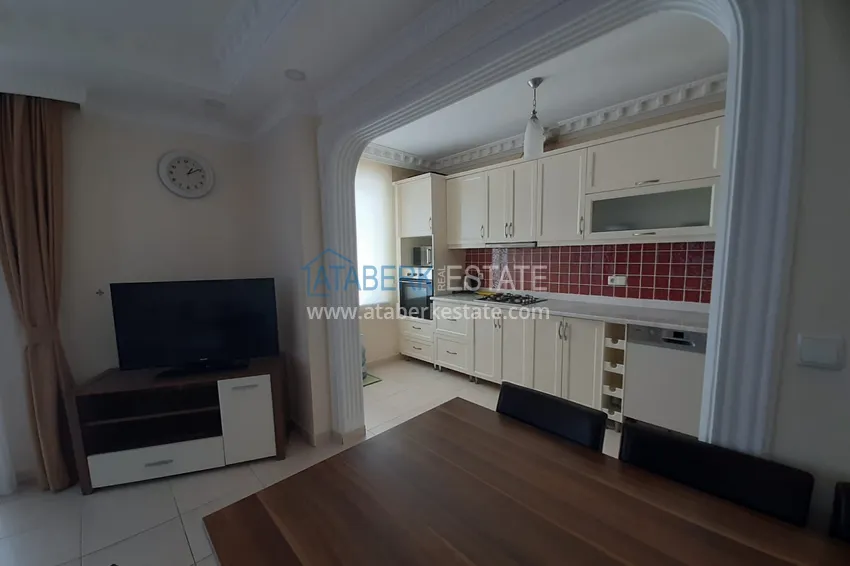Kupuj  Apartament 2+1 w Alanya, dzielnica Mahmutlar — z meblami, przeszklonymi balkonami w pobliżu Yekta Mall 5 